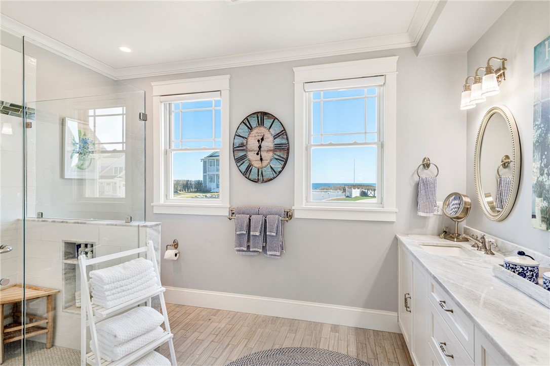 1048 Ocean Road Narragansett, RI 02882 - Photo 28 of 50 First Floor Primary Bath w/ his hers sinks,walk-in shower,ocean views