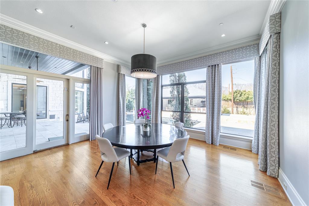 4511 Watauga Road Dallas, TX 75209 - Photo 17 of 40 a view of a dining room with furniture window and wooden floor