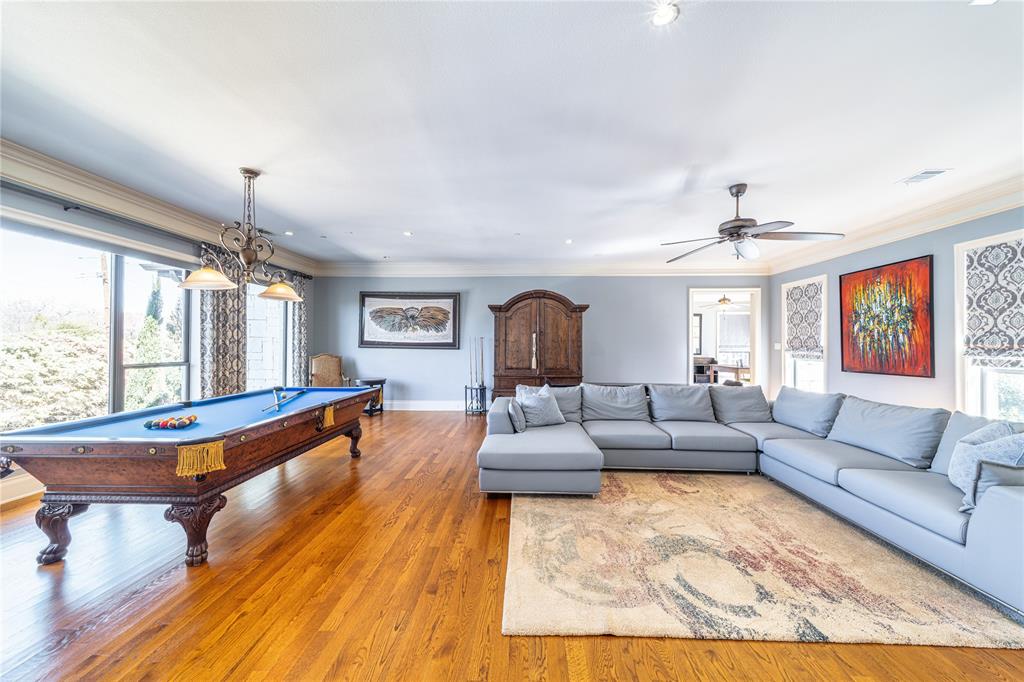 4511 Watauga Road Dallas, TX 75209 - Photo 22 of 40 a living room with furniture and a large window