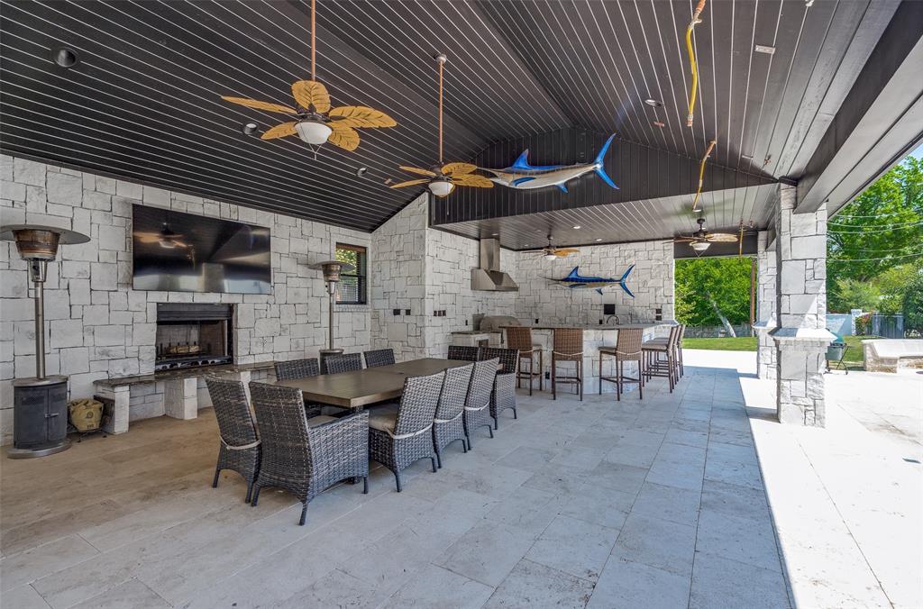 4511 Watauga Road Dallas, TX 75209 - Photo 38 of 40 a view of a patio with table and chairs