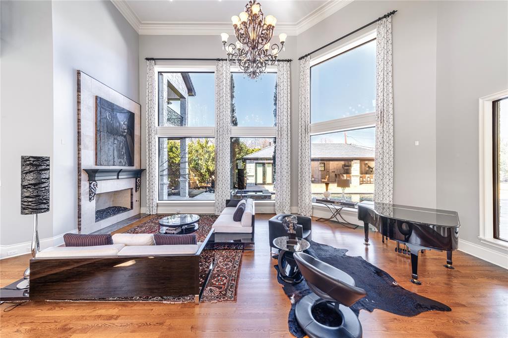 4511 Watauga Road Dallas, TX 75209 - Photo 4 of 40 a living room with furniture large window and wooden floor