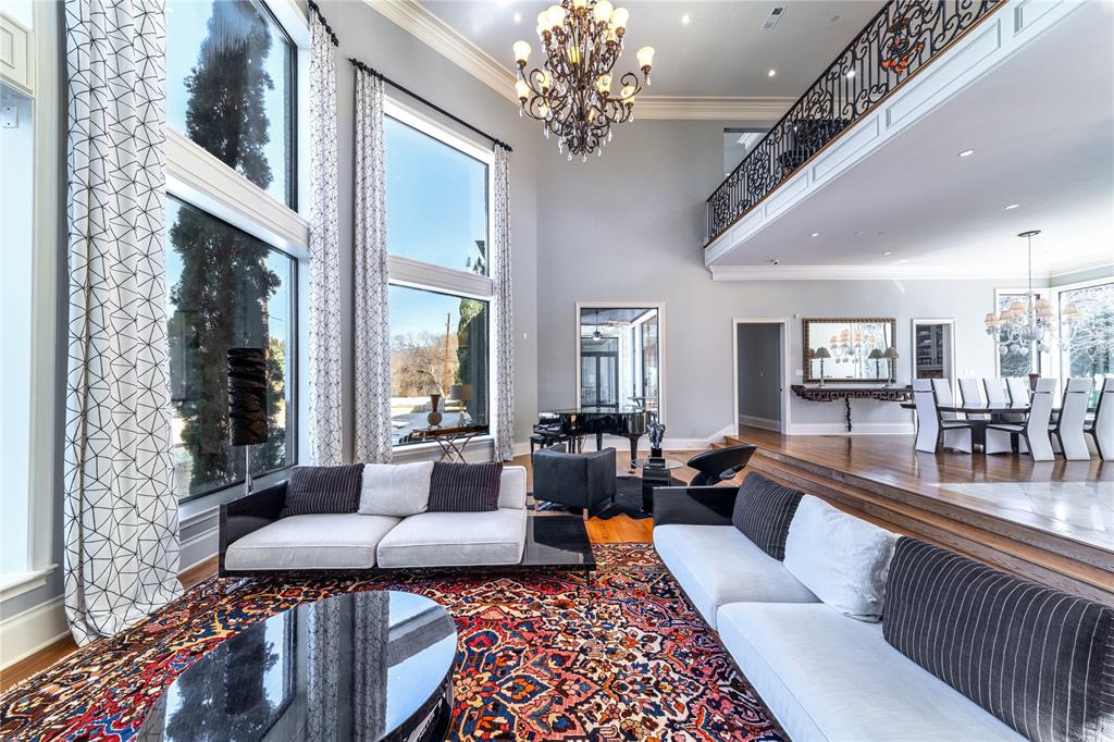4511 Watauga Road Dallas, TX 75209 - Photo 6 of 40 a living room with furniture and a chandelier