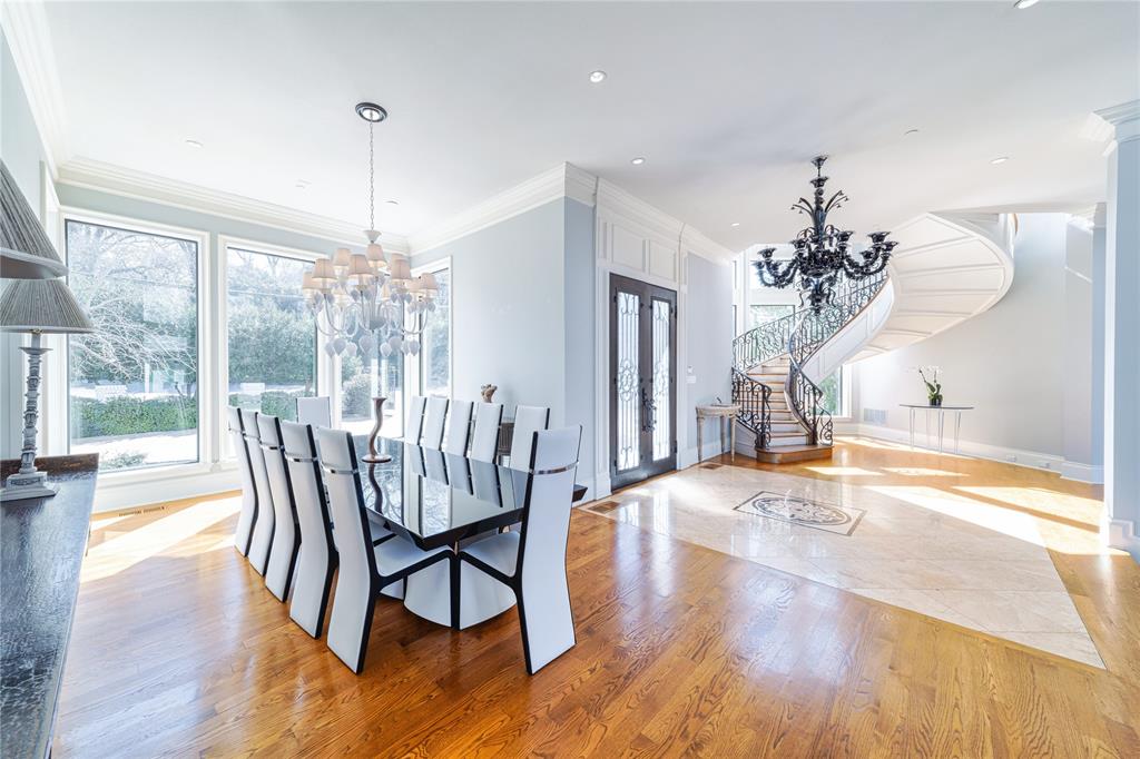 4511 Watauga Road Dallas, TX 75209 - Photo 7 of 40 a view of a dining room with furniture wooden floor and chandelier