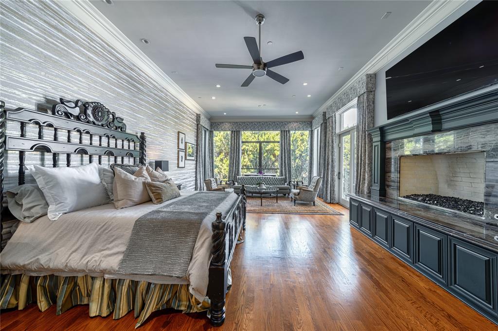 4511 Watauga Road Dallas, TX 75209 - Photo 8 of 40 a living room with furniture and a flat screen tv