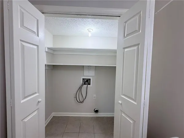a bathroom with a glass door shower