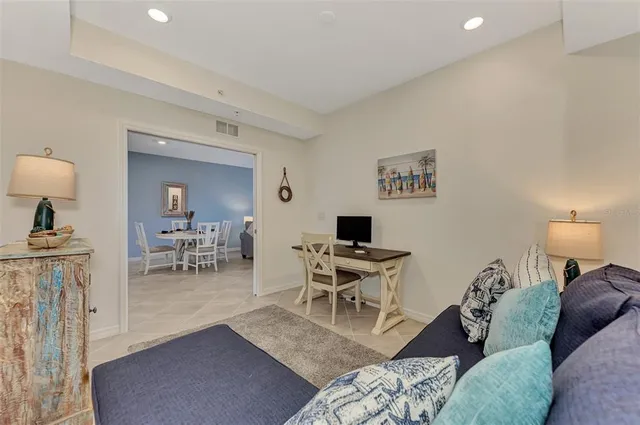 a living room with furniture and a table