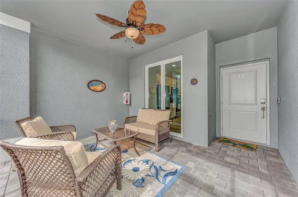 a living room with furniture and a table