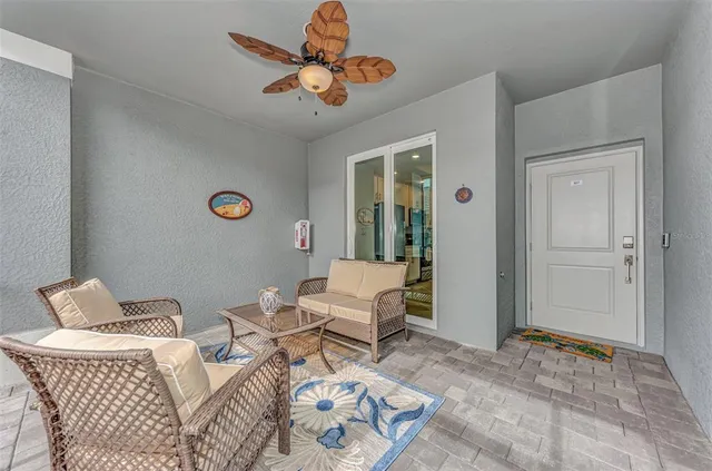 a living room with furniture and a table