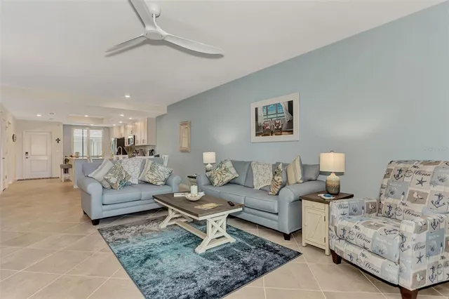 a living room with furniture and a rug