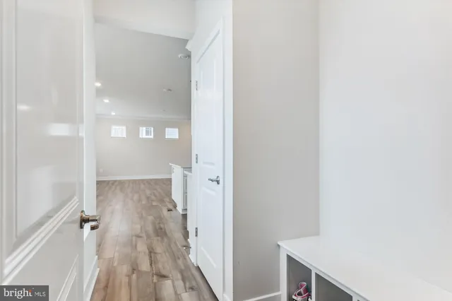 a bathroom with a sink and a glass door