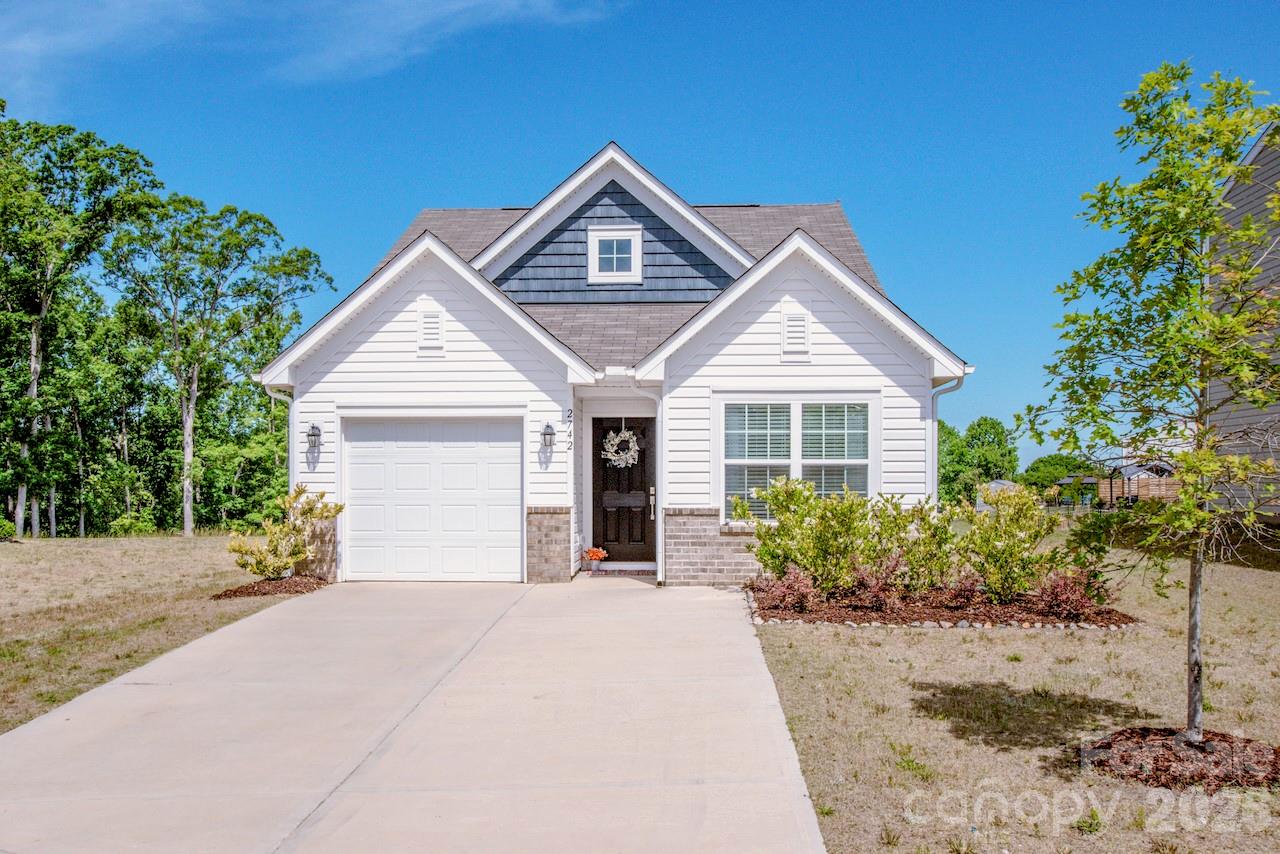 2742 Legacy Ridge Lane Catawba, NC 28609 - Photo 2 of 36 a front view of a house with a yard and garage