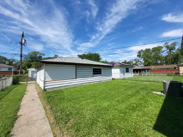 a view of an empty room with a garage