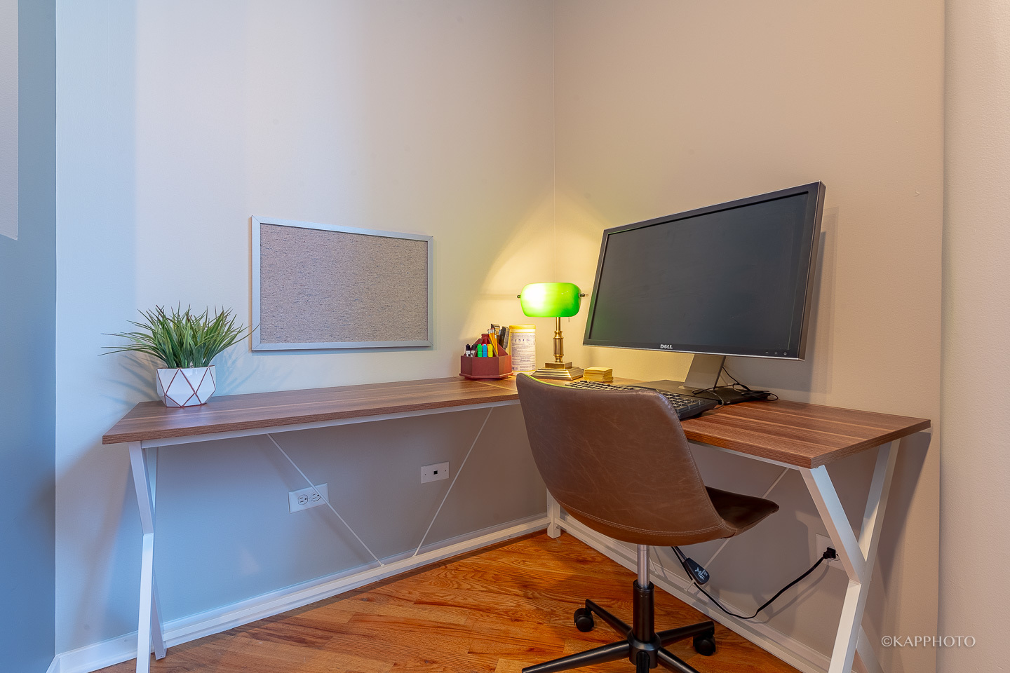 500 South Clinton Street, Unit 133 Chicago, IL 60607 - Photo 11 of 28 a workspace with furniture and a flat screen tv