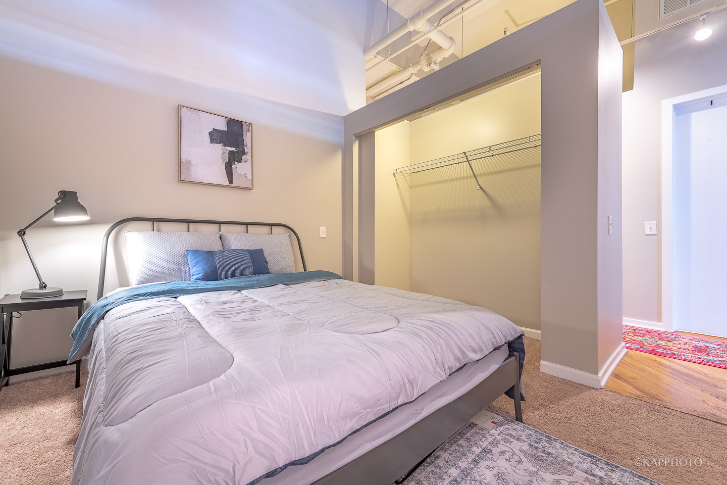 500 South Clinton Street, Unit 133 Chicago, IL 60607 - Photo 16 of 28 a bedroom with a bed and window