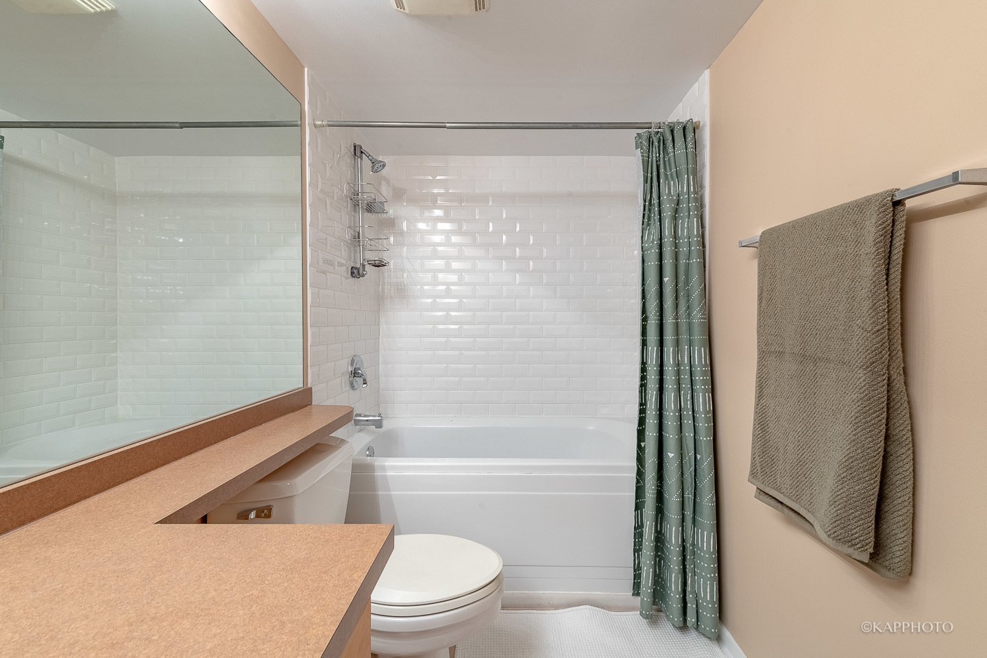 500 South Clinton Street, Unit 133 Chicago, IL 60607 - Photo 20 of 28 a bathroom with a shower and a toilet