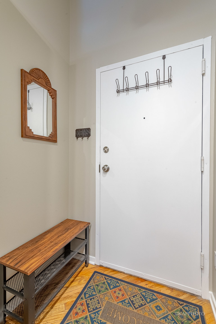 500 South Clinton Street, Unit 133 Chicago, IL 60607 - Photo 3 of 28 a view of a room with wooden floor