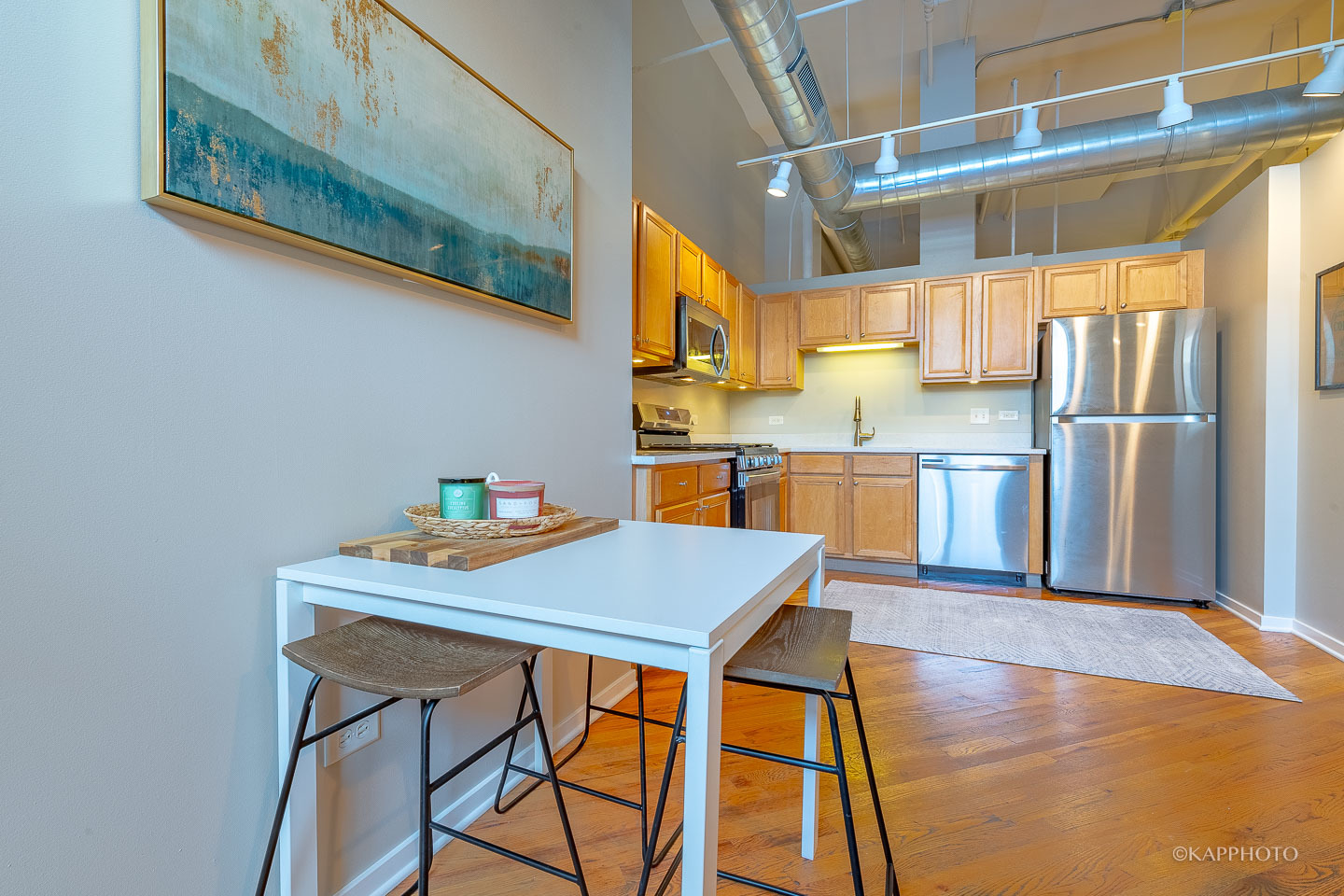 500 South Clinton Street, Unit 133 Chicago, IL 60607 - Photo 10 of 28 a view of a dining room with furniture and a window