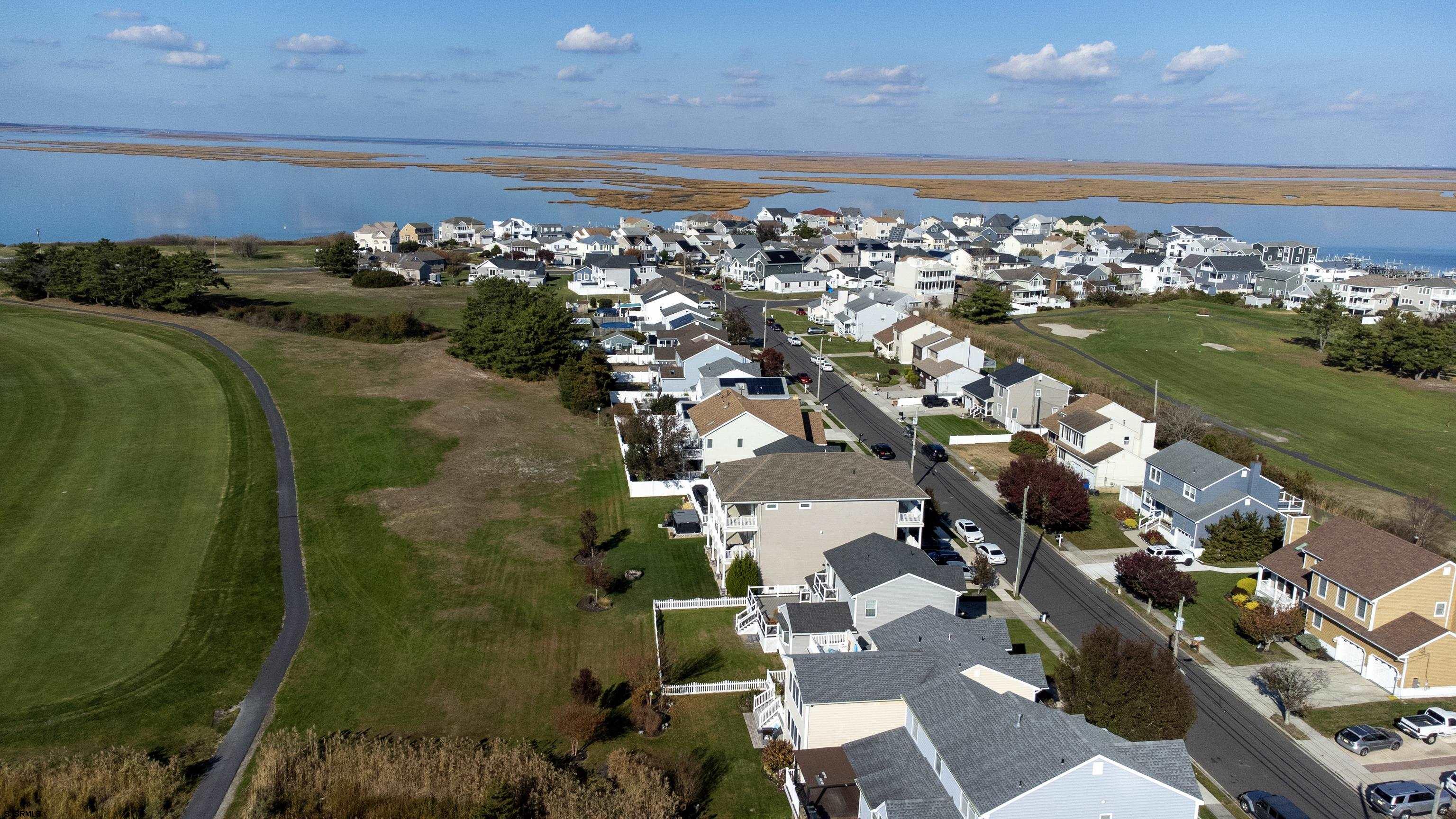 214 Hagen Road Brigantine, NJ 08203 - Photo 34 of 34 an aerial view of a house with a yard