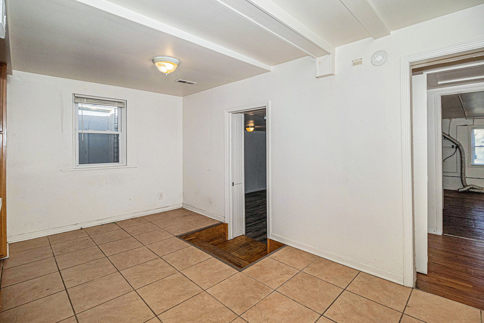2036 Thornton Lansing Road Lansing, IL 60438 - Photo 4 of 17 a view of an empty room and window