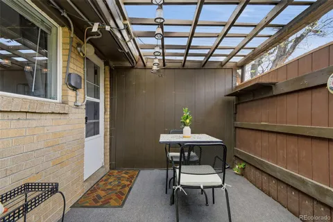 a view of a chairs and table in the room
