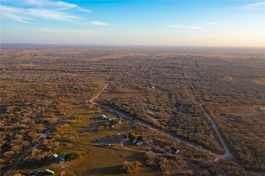 22364 Private Road 1080 Mathis, TX 78368 - Photo 11 of 15 an aerial view of residential house and ocean