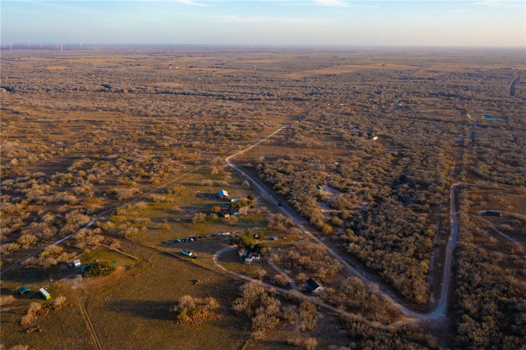 22364 Private Road 1080 Mathis, TX 78368 - Photo 13 of 15 an aerial view of house with yard and mountain view in back