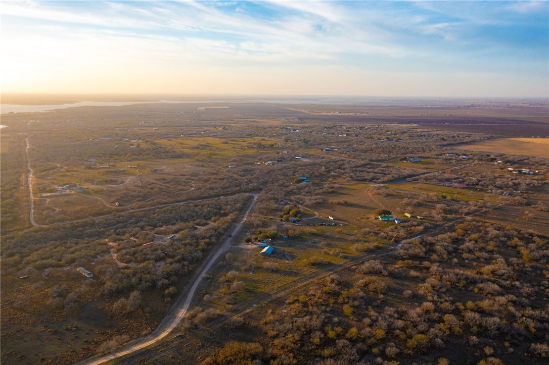 22364 Private Road 1080 Mathis, TX 78368 - Photo 6 of 15 an aerial view of residential houses with outdoor space
