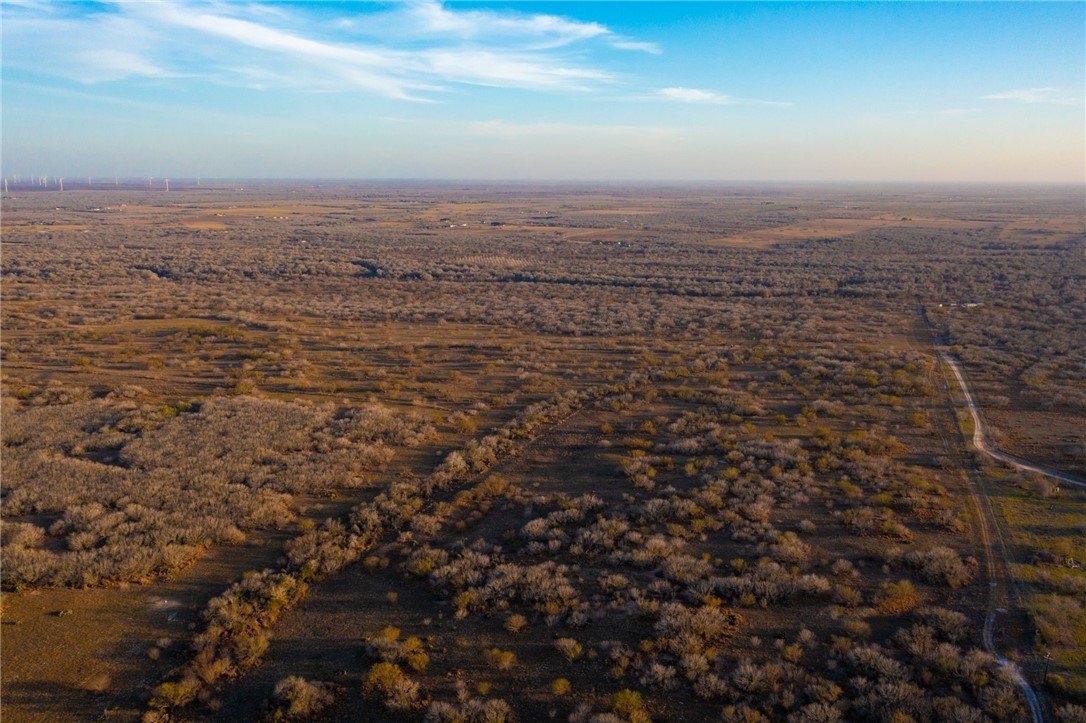 22364 Private Road 1080 Mathis, TX 78368 - Photo 10 of 15 an aerial view of residential houses with outdoor space