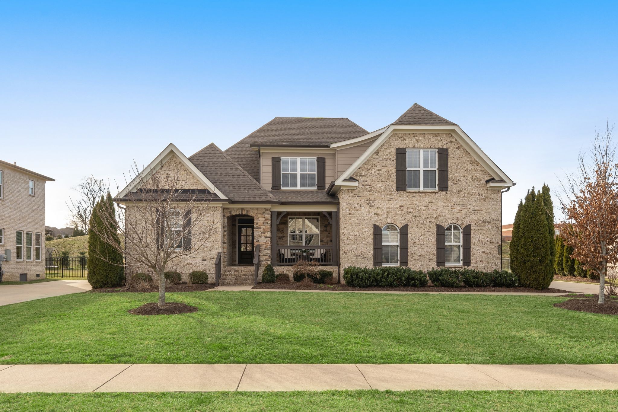 3226 Pleasantville Bridge Road Thompson's Station, TN 37179 - Photo 1 of 59 a front view of a house with a yard