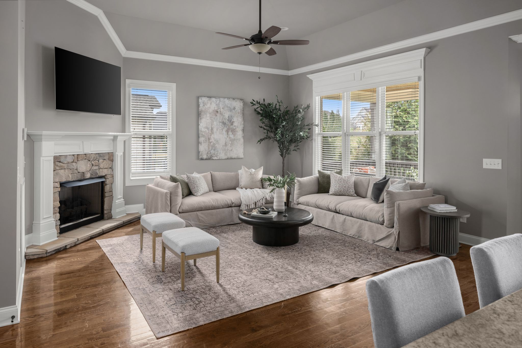 3226 Pleasantville Bridge Road Thompson's Station, TN 37179 - Photo 11 of 59 a living room with furniture a fireplace and a flat screen tv