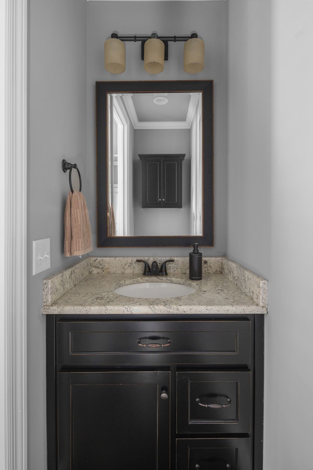 3226 Pleasantville Bridge Road Thompson's Station, TN 37179 - Photo 29 of 59 a bathroom with a granite countertop sink a toilet and a mirror