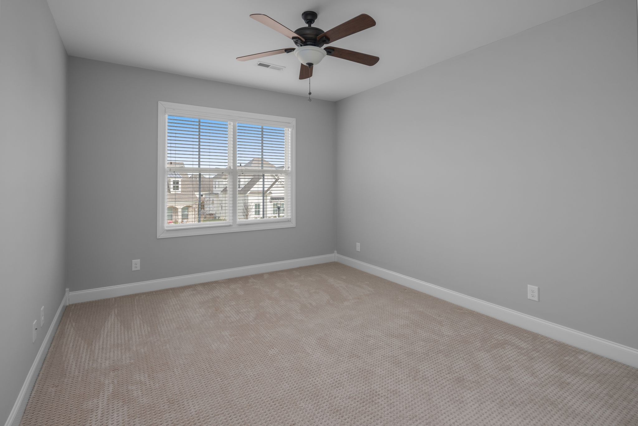 3226 Pleasantville Bridge Road Thompson's Station, TN 37179 - Photo 41 of 59 an empty room with a window and a fan