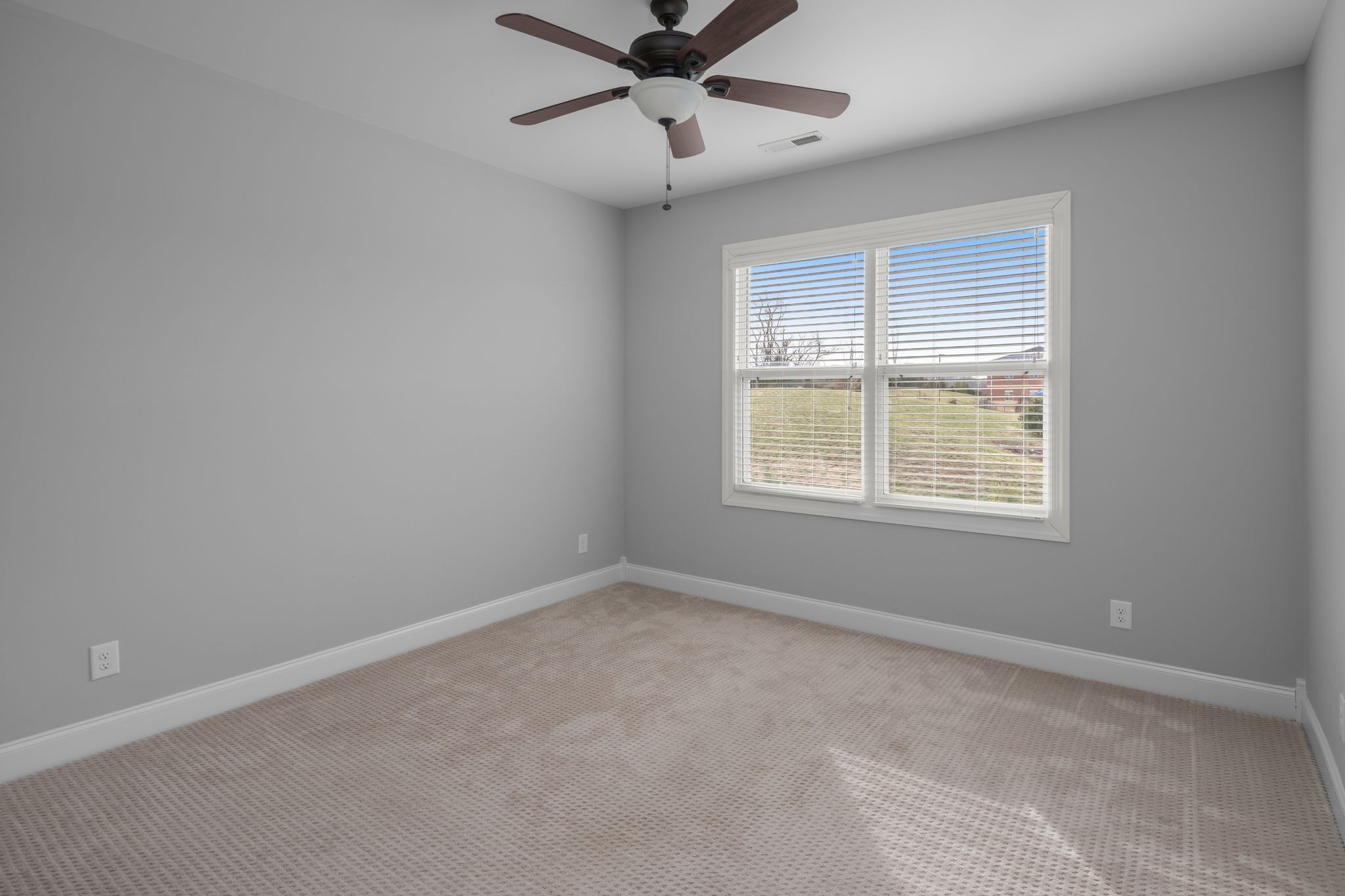 3226 Pleasantville Bridge Road Thompson's Station, TN 37179 - Photo 42 of 59 an empty room with a window and a fan