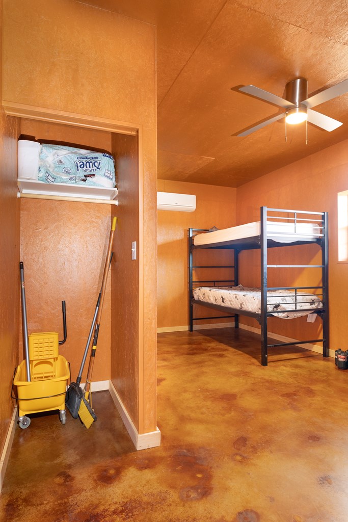 497 County Road Melvin, TX 76858 - Photo 11 of 44 a view of a room with wooden floor