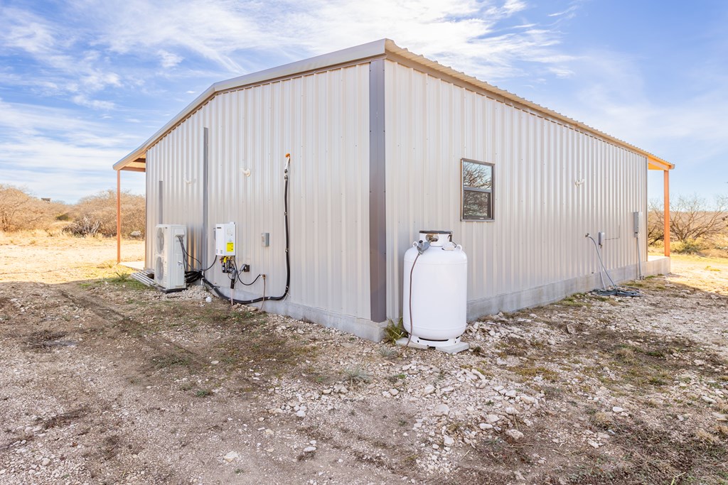 497 County Road Melvin, TX 76858 - Photo 19 of 44 a view of a backyard