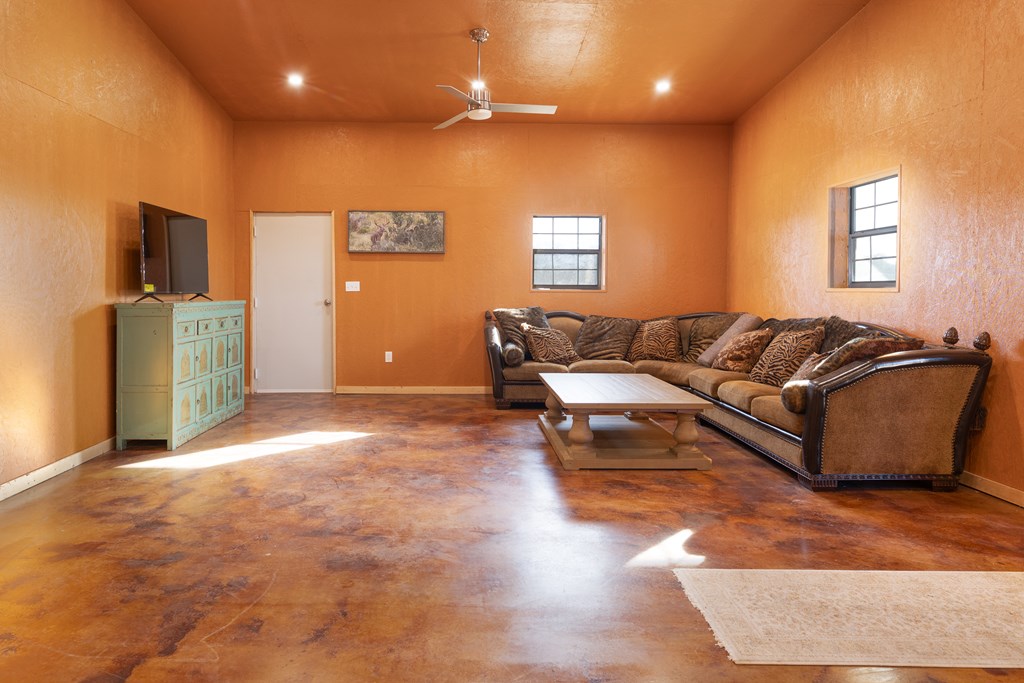 497 County Road Melvin, TX 76858 - Photo 2 of 44 a living room with furniture and a window