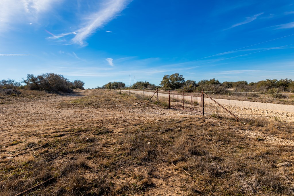 497 County Road Melvin, TX 76858 - Photo 32 of 44 a view of a field with an ocean view