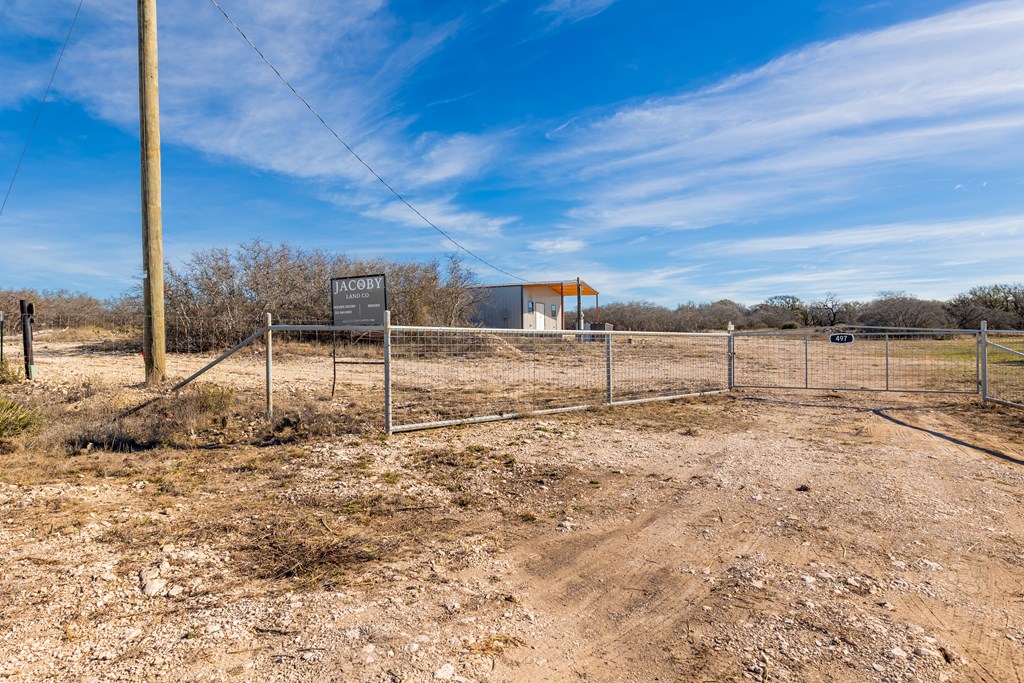497 County Road Melvin, TX 76858 - Photo 39 of 44 a view of a yard with wooden fence