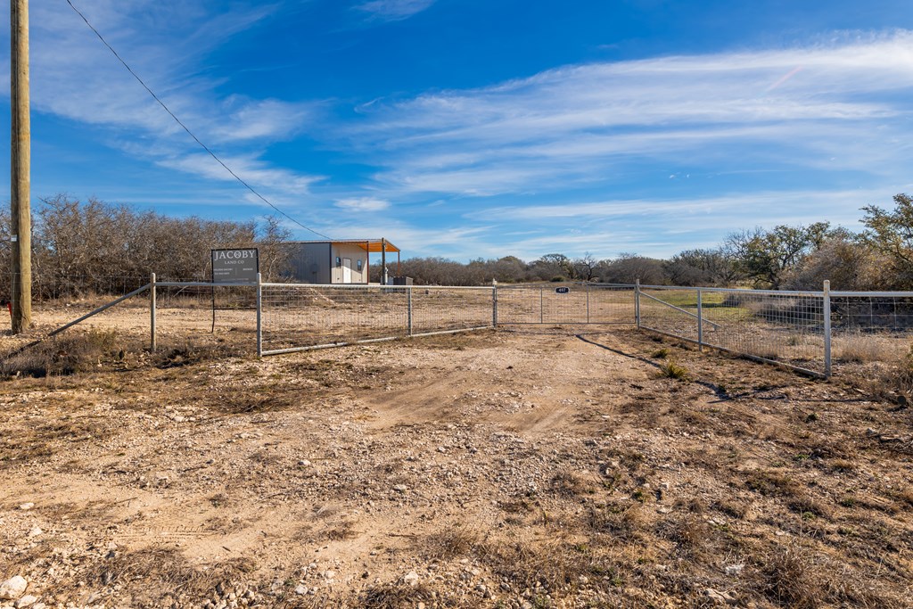 497 County Road Melvin, TX 76858 - Photo 40 of 44 a view of a yard with wooden fence