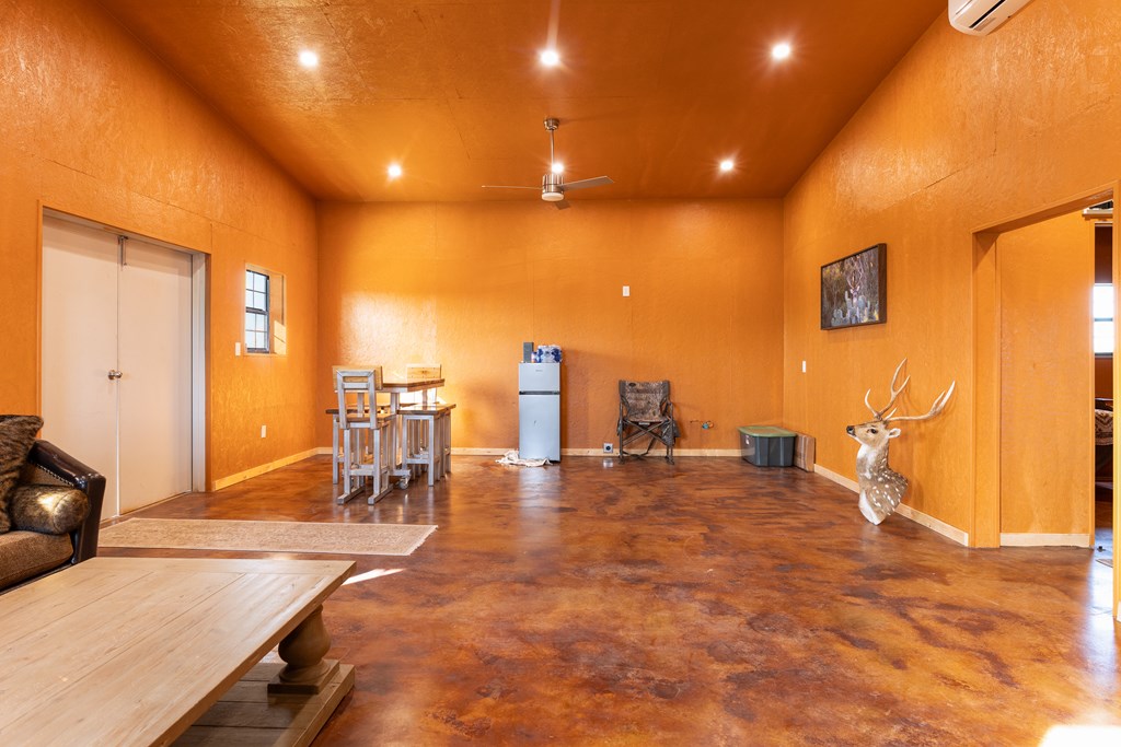 497 County Road Melvin, TX 76858 - Photo 4 of 44 a view of a room with gym equipment