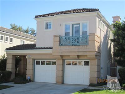 3904 Sunsetridge Road Moorpark, CA 93021 - Photo 1 of 8 a front view of a house with garden