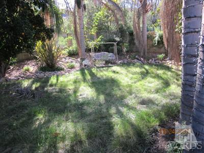 3904 Sunsetridge Road Moorpark, CA 93021 - Photo 3 of 8 a view of backyard with plants and trees