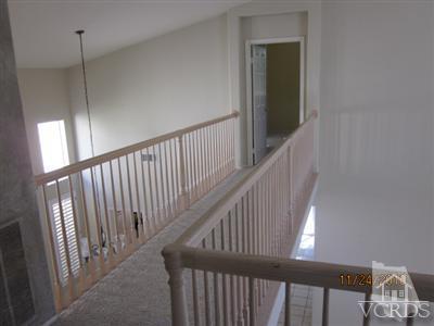 3904 Sunsetridge Road Moorpark, CA 93021 - Photo 7 of 8 a view of staircase with rug