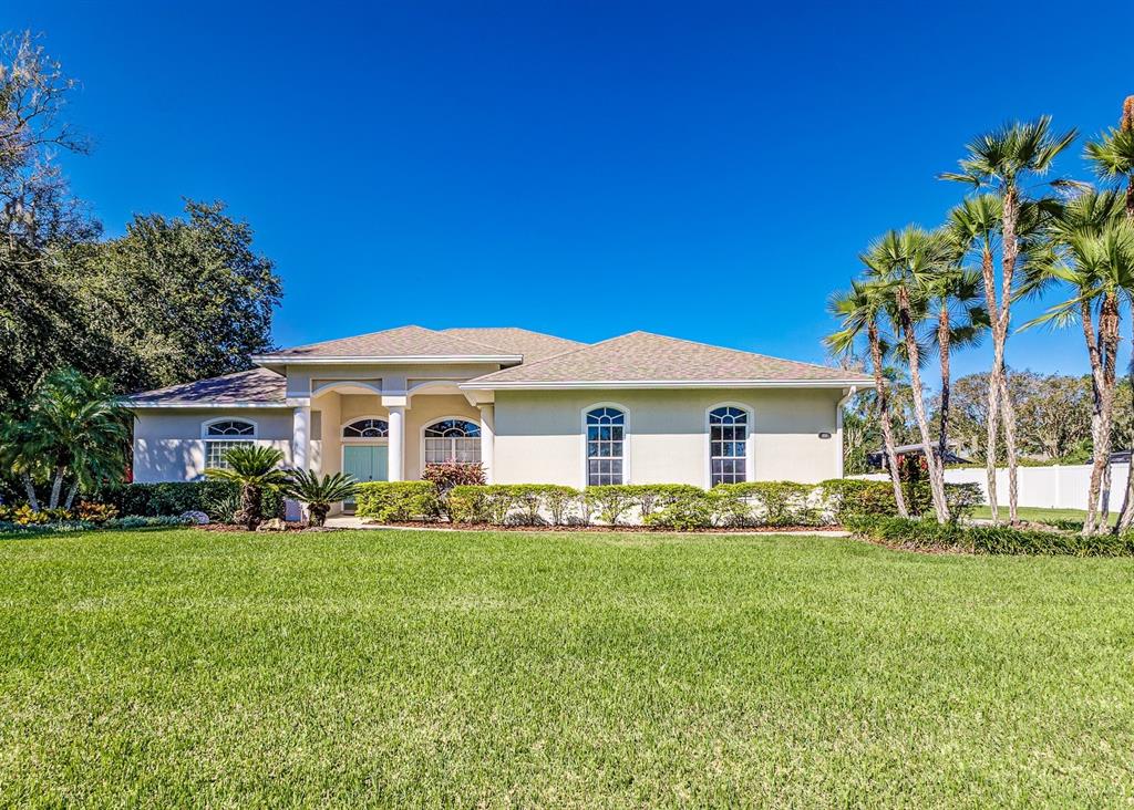 870 De La Bosque Avenue Bartow, FL 33830 - Photo 1 of 1 a front view of a house with a garden
