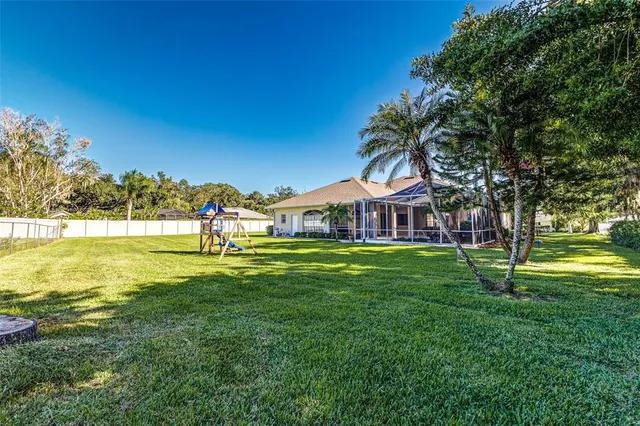 a view of a house with a big yard