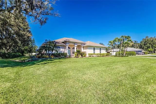 a view of a house with a big yard