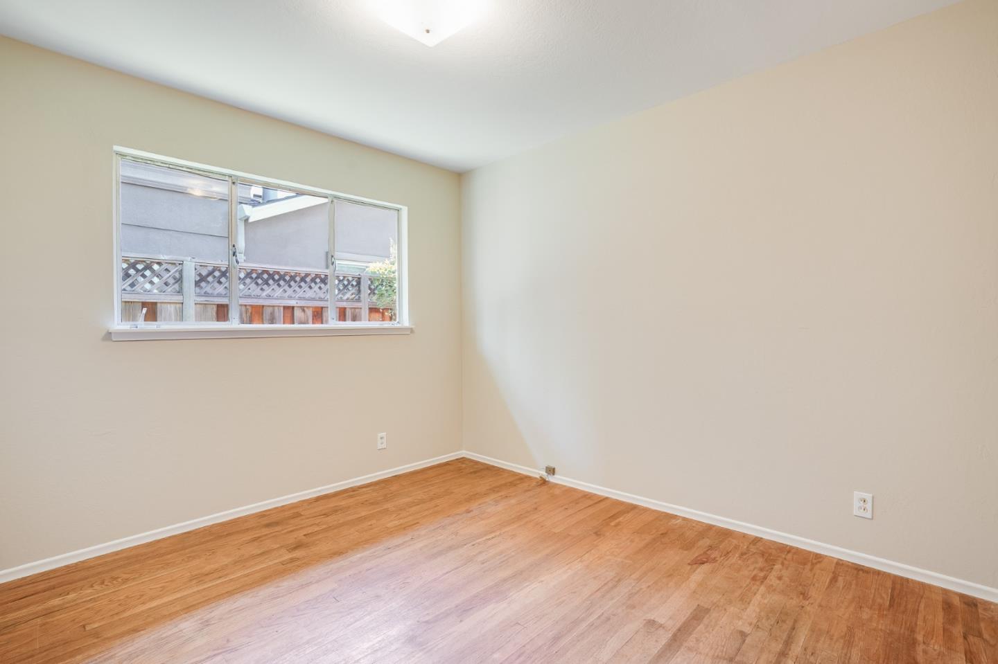 4559 Piper Drive San Jose, CA 95129 - Photo 16 of 30 a view of a big room with wooden floor and fan