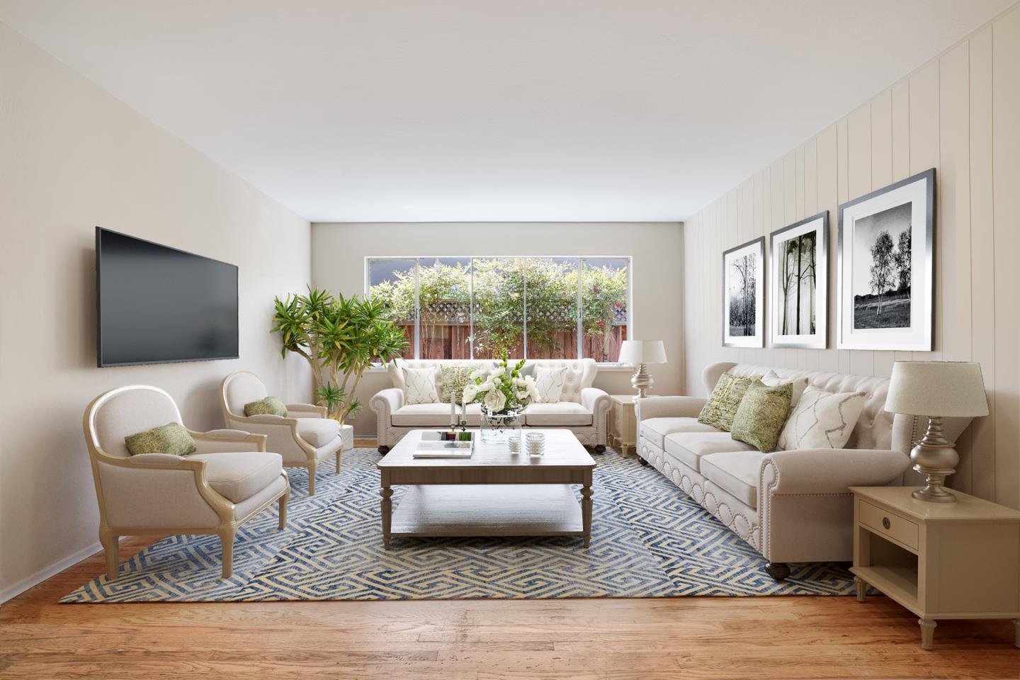 4559 Piper Drive San Jose, CA 95129 - Photo 6 of 30 a living room with furniture and a flat screen tv