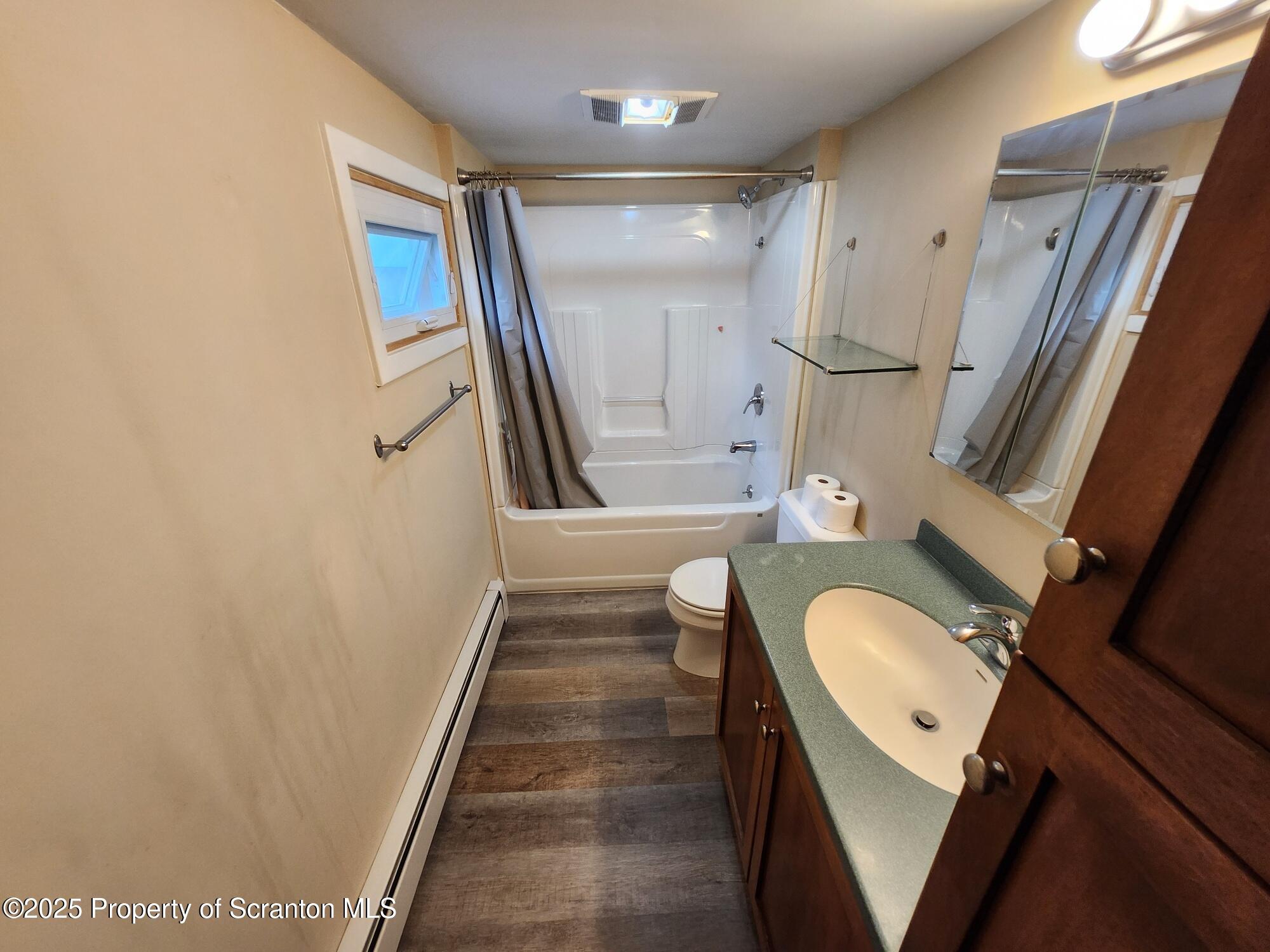 16 Flanagan Street Pringle, PA 18704 - Photo 19 of 33 a bathroom with a granite countertop sink toilet and shower