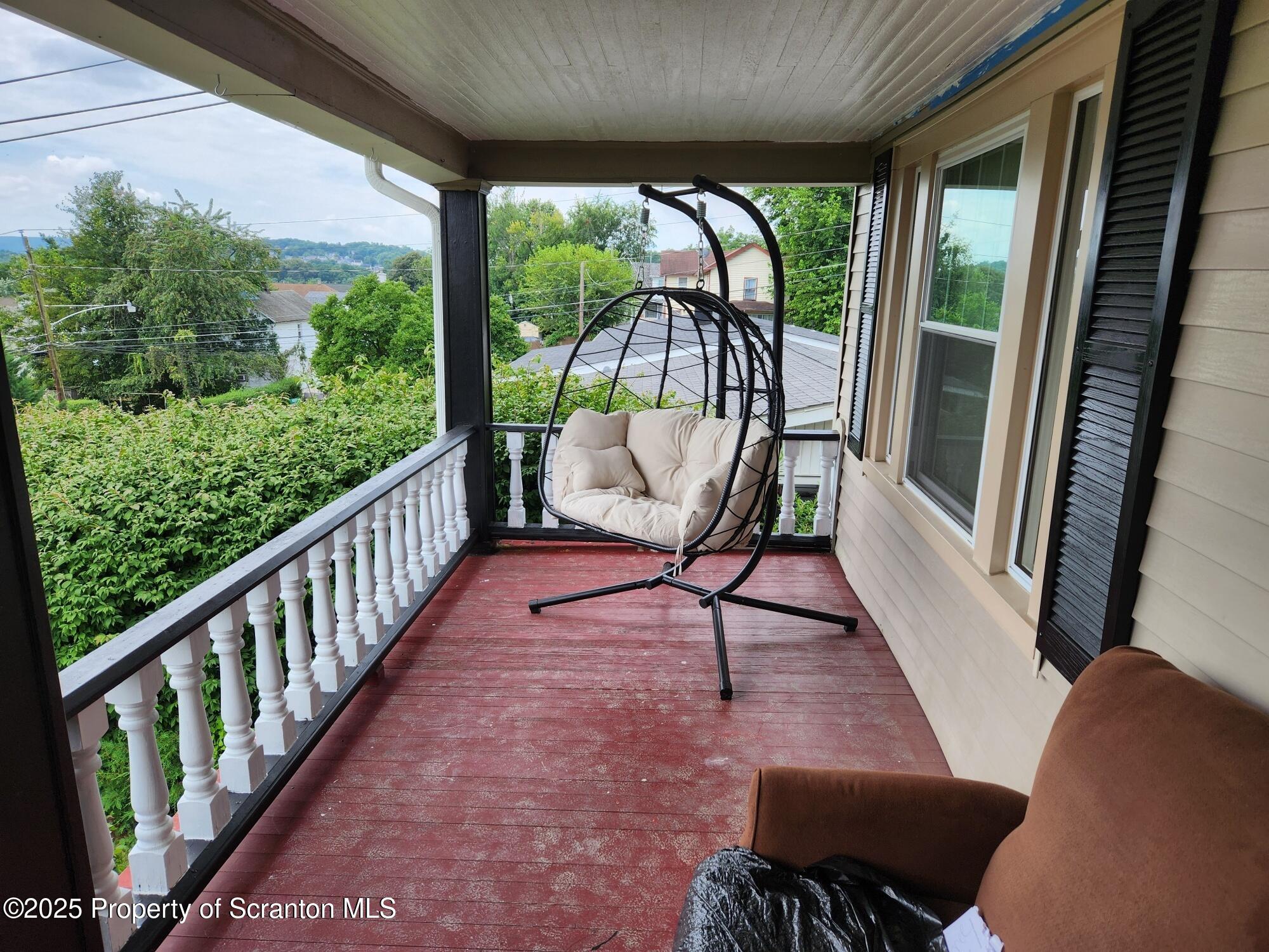 16 Flanagan Street Pringle, PA 18704 - Photo 4 of 33 a view of two chairs in the balcony